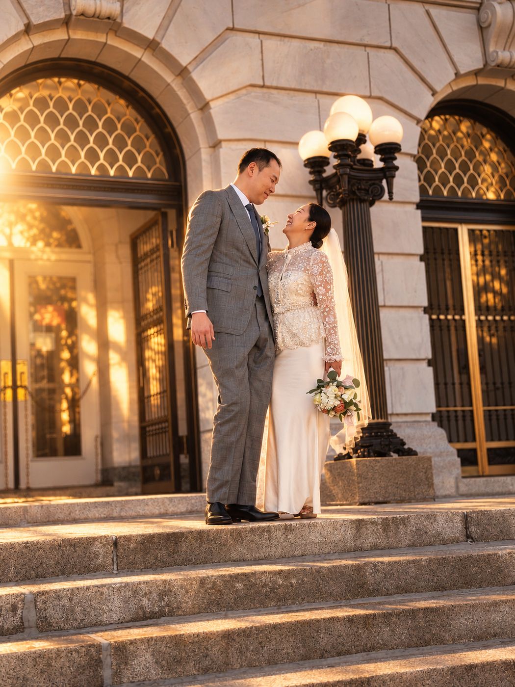 Isabella and Michael on the stone steps at golden hour